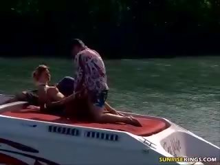 Cutie gets banged by two on boat